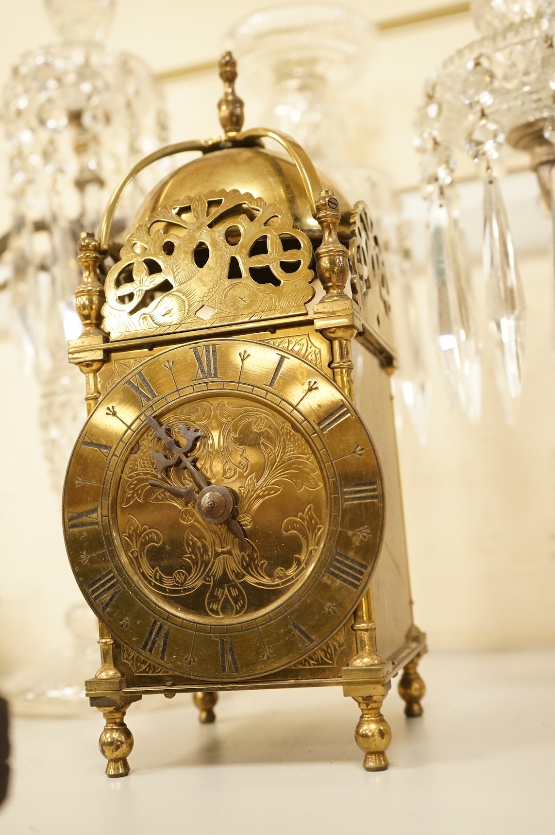 A small brass lantern clock, 26cm high